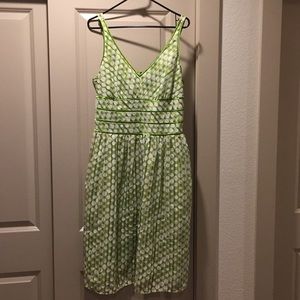 Lime green and polka dot dress.